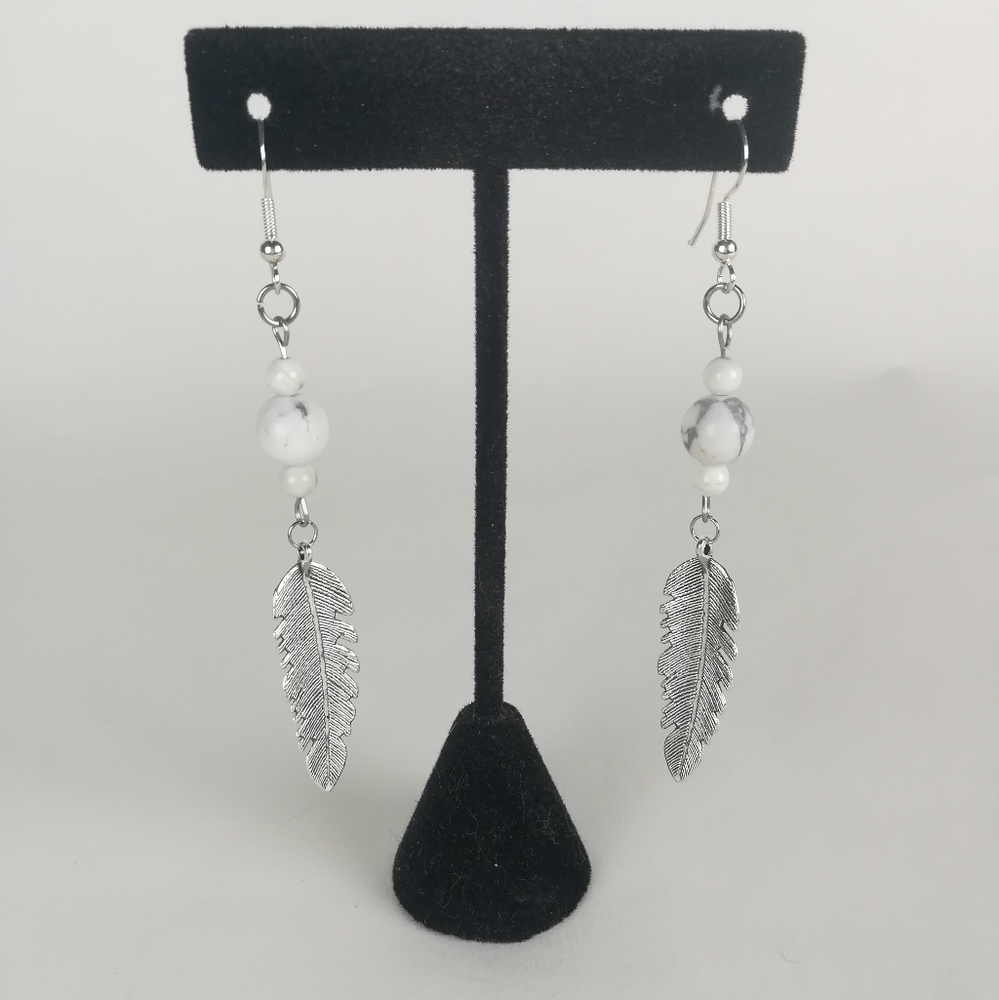 Simple feather earrings made with natural White Howlite beads